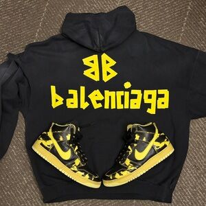 Balenciaga Black Sweatshirt with Gold Accents